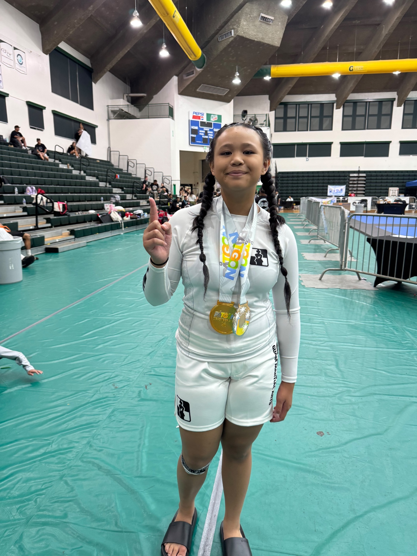 Sophia Miranda wearing her medals after competing