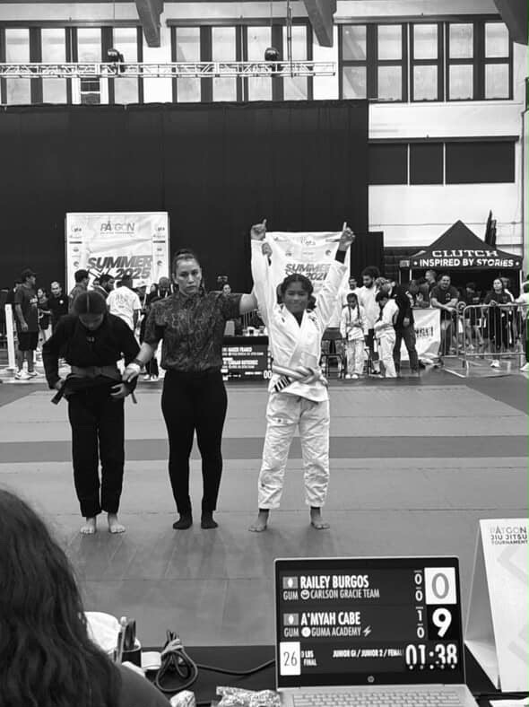 A’myah Cabe’s hand raised in victory