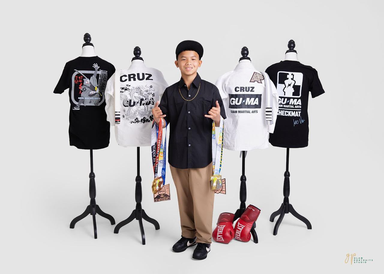 Ahzyiah Cruz with his medals and GUMA competition gear