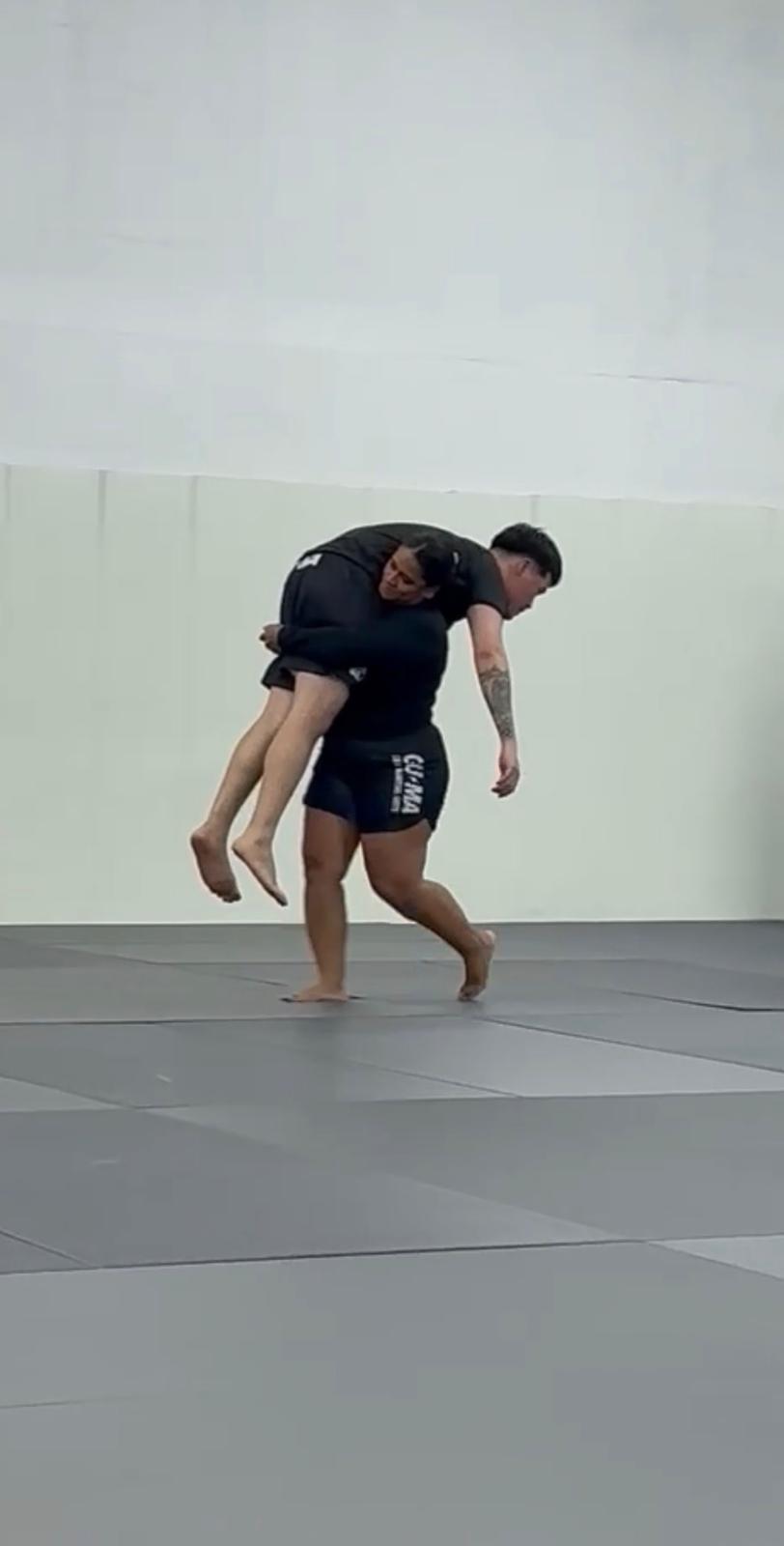 Desireé Vasquez training takedowns at GUMA