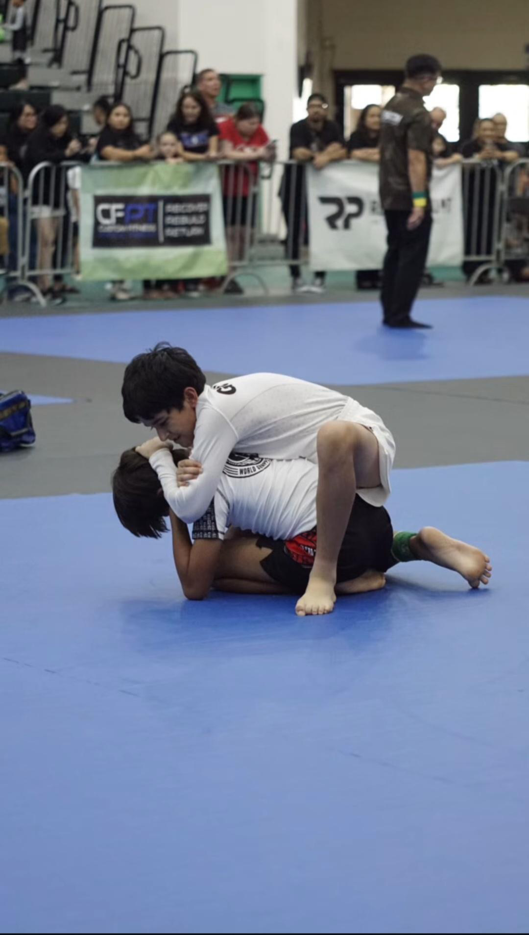 Tanish Dewan competing on the mats