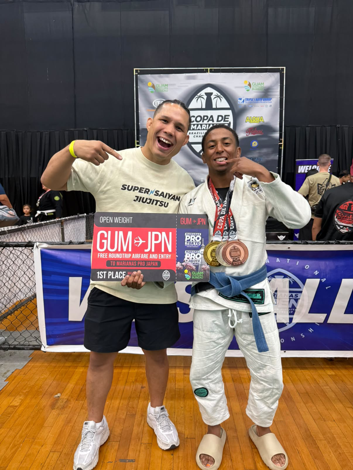 Brendan Sanders on the podium with Sensei Jon
