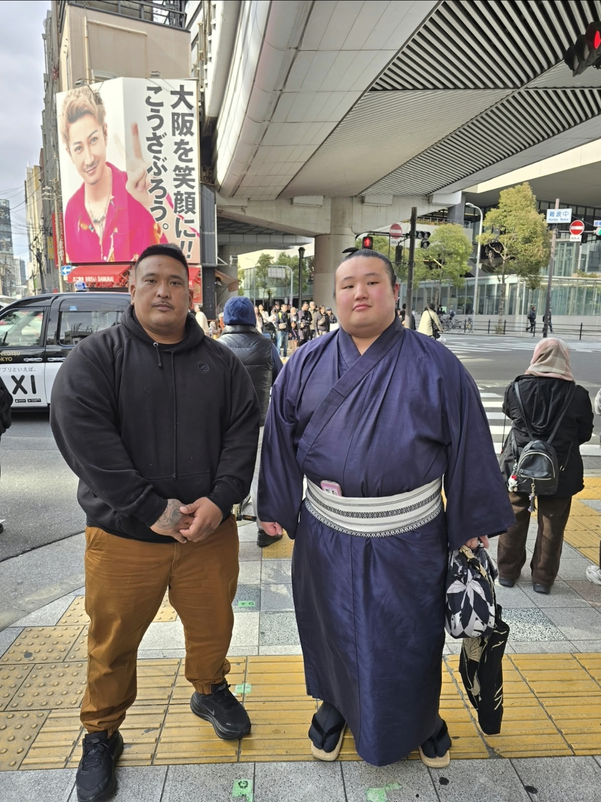 Anthony Salas in Japan with a sumo wrestler