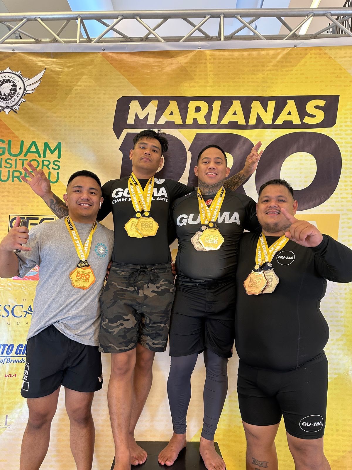Joel Ymballa on the podium at Marianas Pro Manila