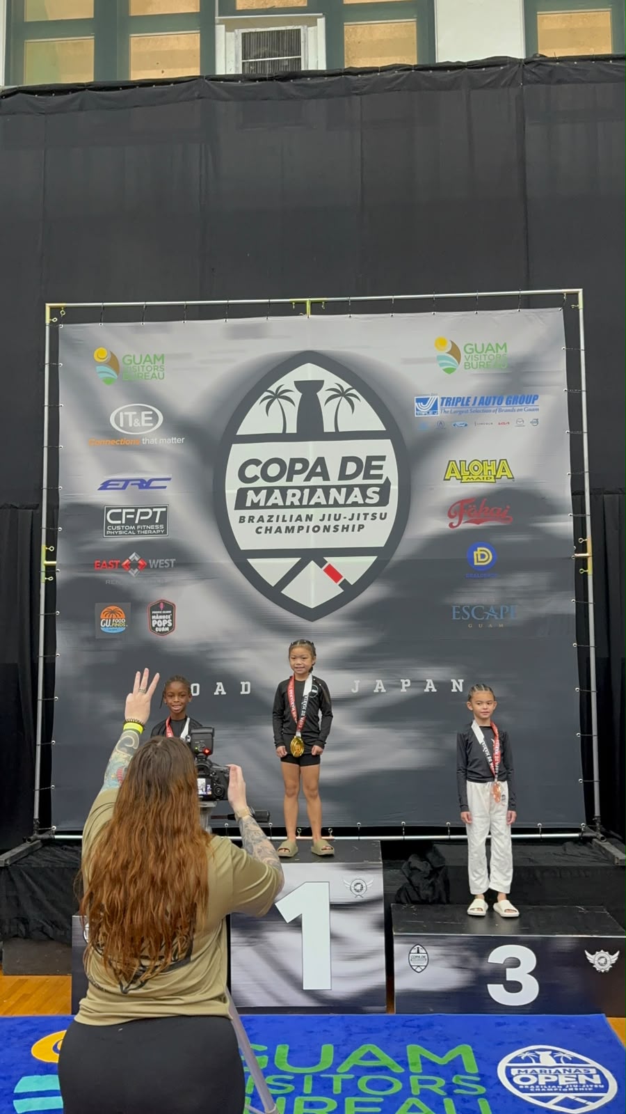 Ivy Sablan on the first-place podium at Copa de Marianas