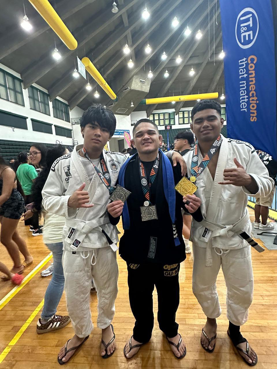 Alexander Mariano with teammates after competing