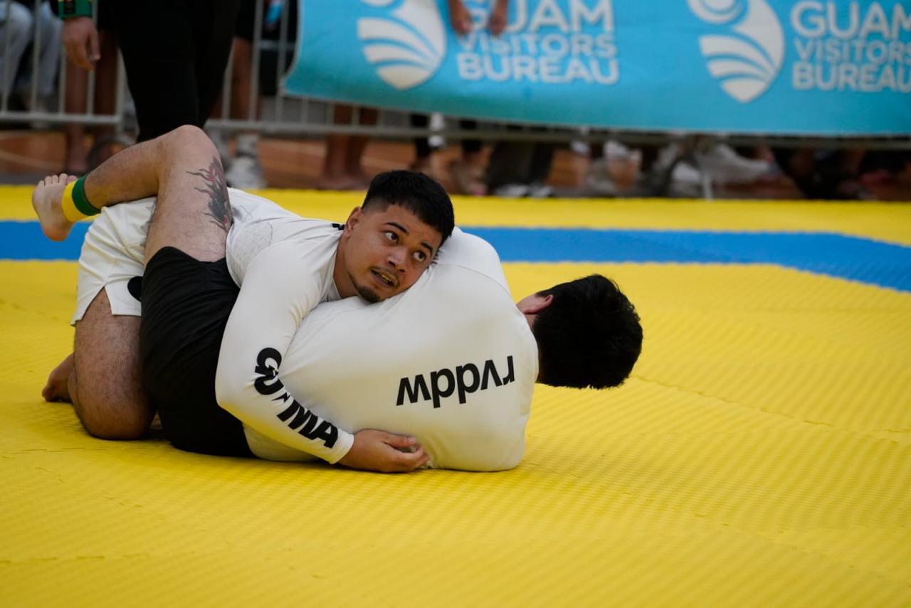 Treyton Marar on the mats during competition