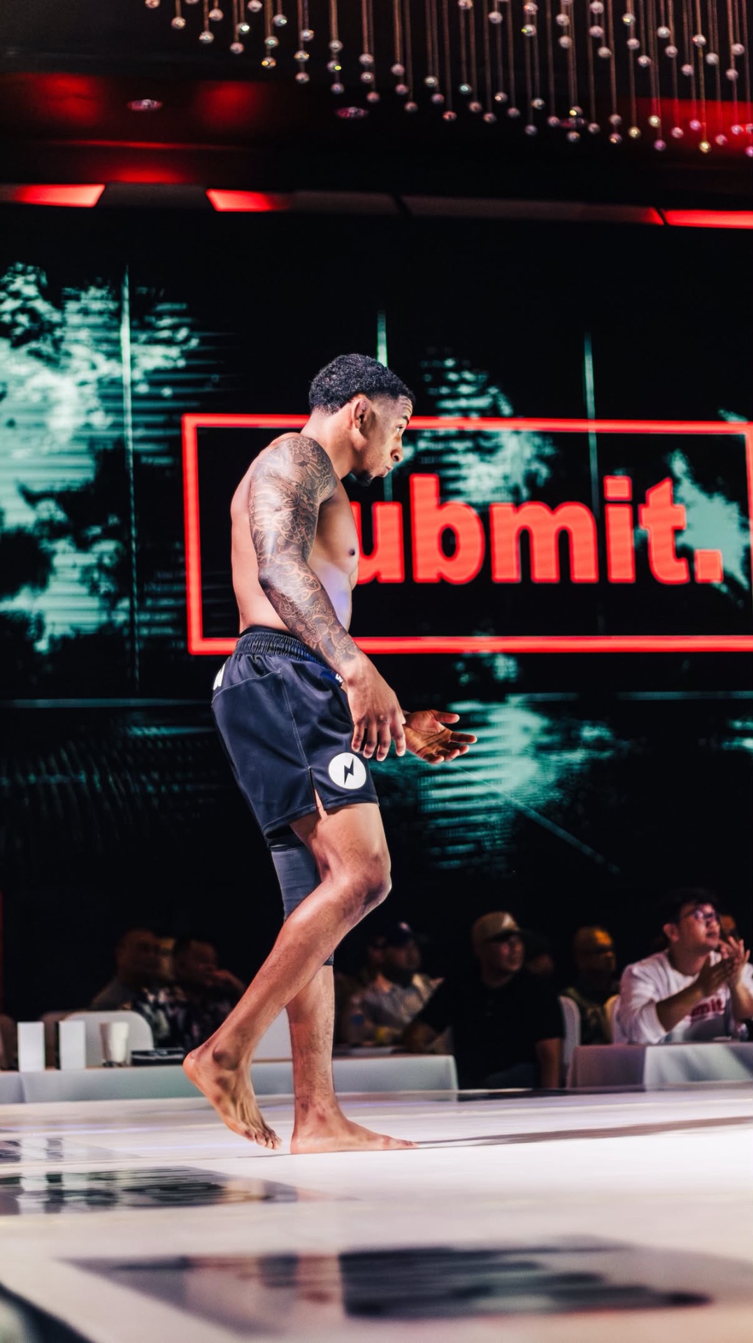 Brendan Sanders walking onto the Submit mat