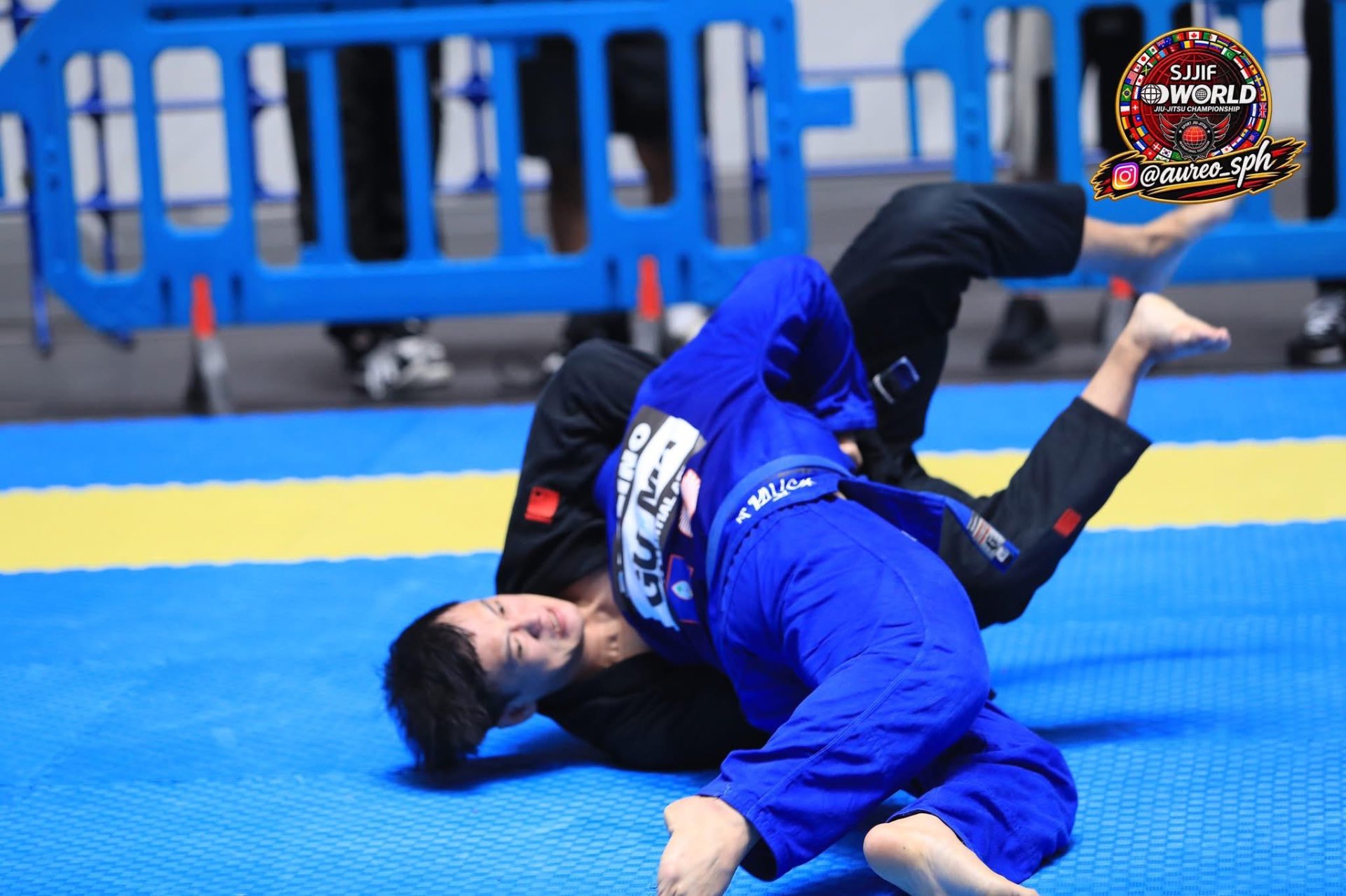 Coach Gabe competing in gi at the SJJIF World Championship